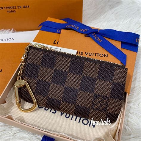 how to open louis vuitton purse